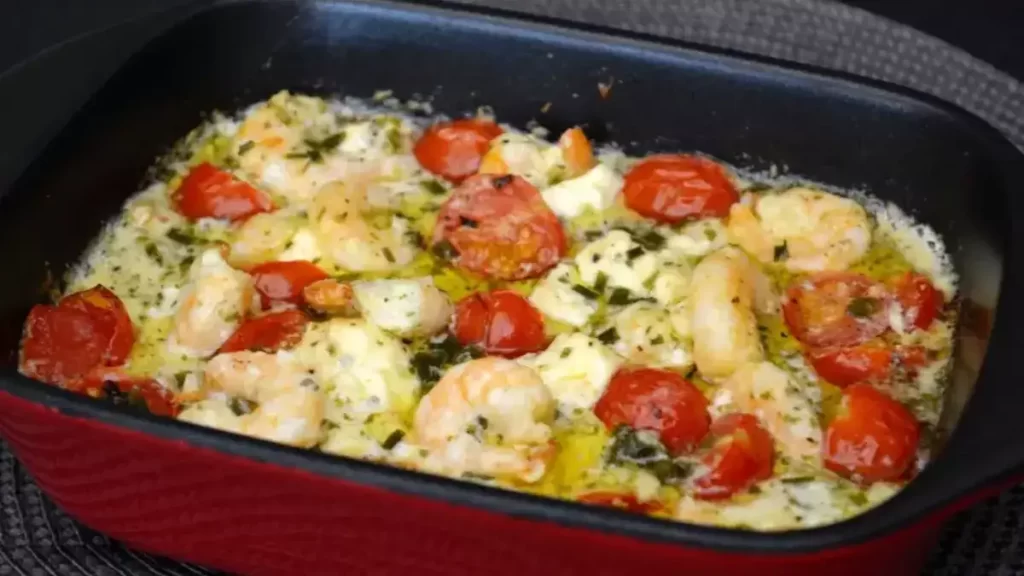 Scampis à l’ail, feta et tomates cerise au four