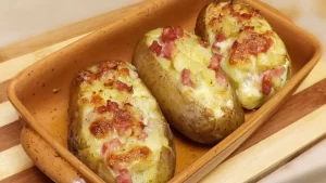 Recette de Pommes de terre farcies au jambon et fromage à raclette