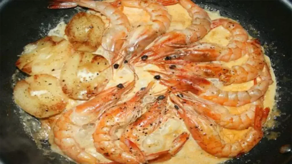 Recette de Gambas à la normande flambées au Calva idéal pour les fêtes